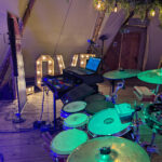 DJ and live percussion setup with LOVE letters at Rylands Farmhouse wedding reception